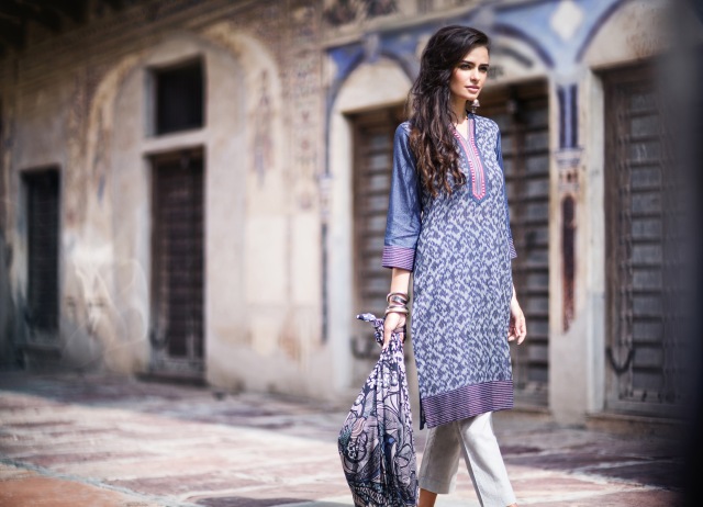 Stylish straight fit kurta with Ikat print front panel, made in denim, with lace trims by Rangriti.